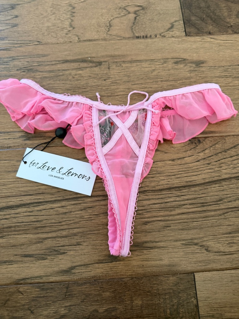 For Love And Lemons Pink Ruffle Mesh Thong